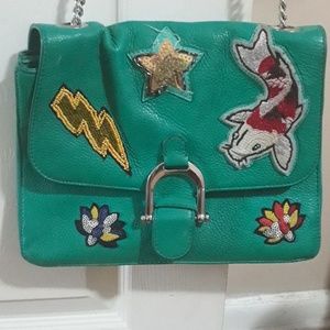 Green leather handbag